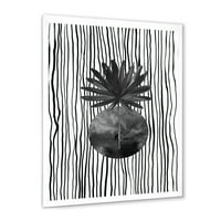 עיצוב אמנות 'פסים בשחור לבן תחת עלה טרופי אני' הדפס אמנות ממוסגר מודרני